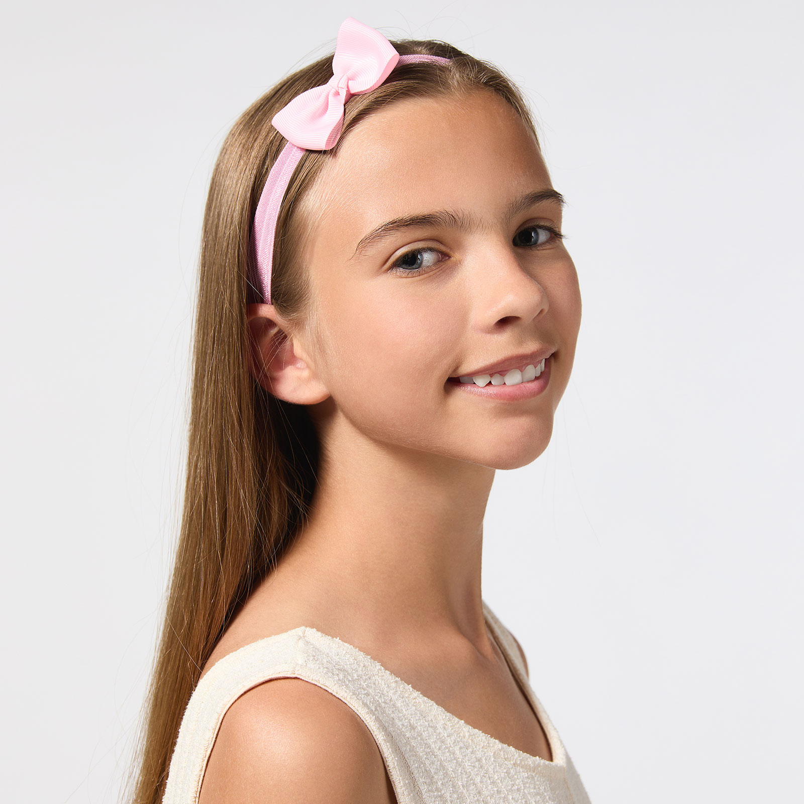 Rosa hårband med rosett