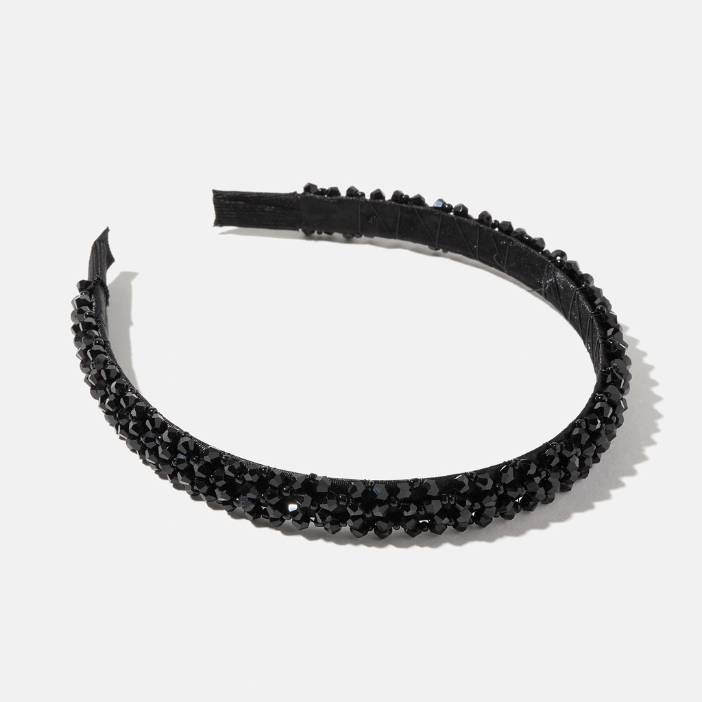 Diadem med svarta stenar