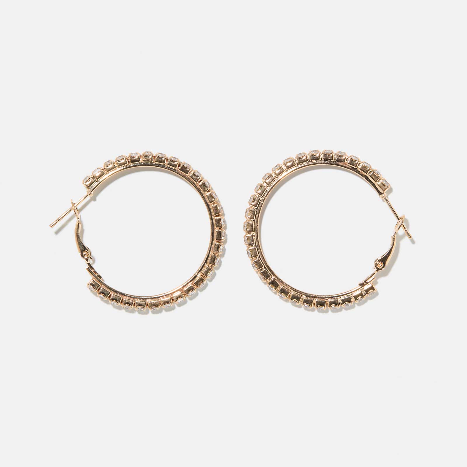 Guldfärgade glittriga hoops 30 mm