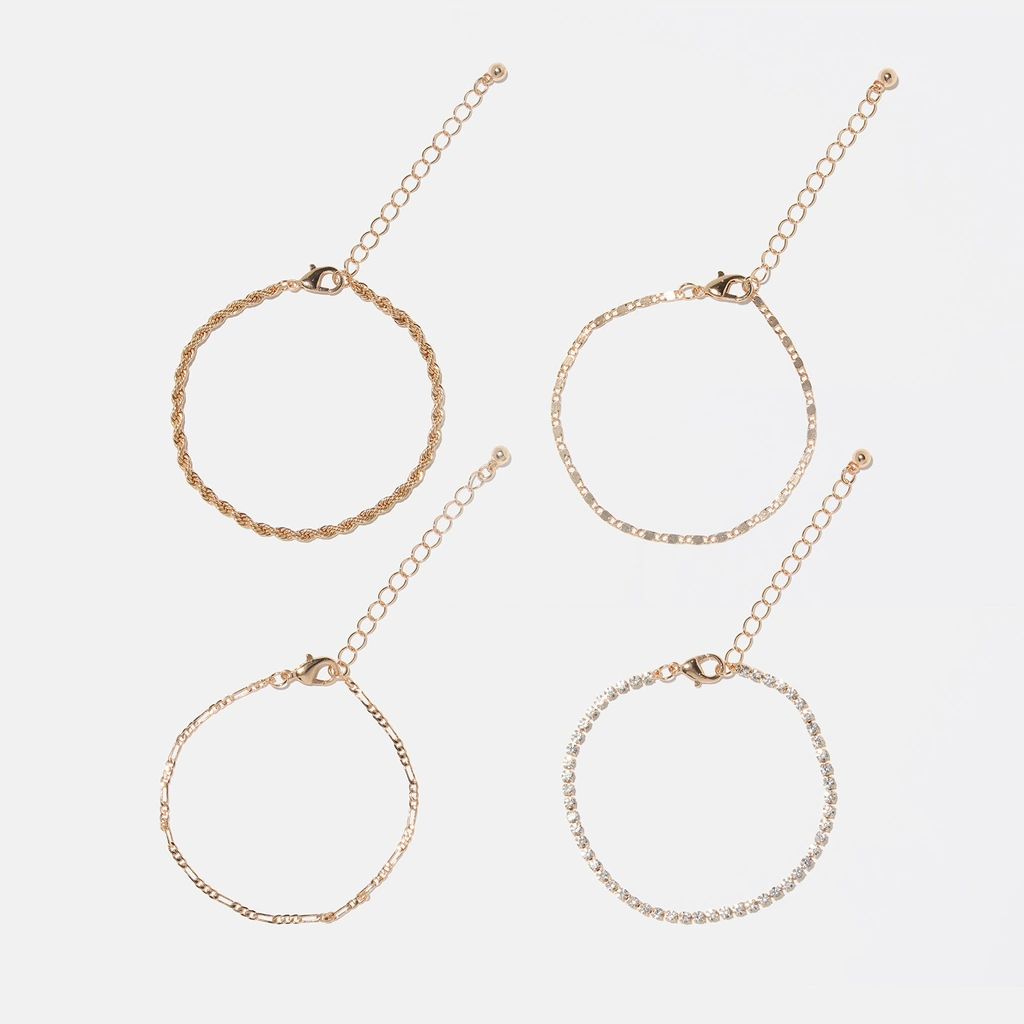 4-pack guldfärgade armband  dam- olika modeller, 18+5 cm