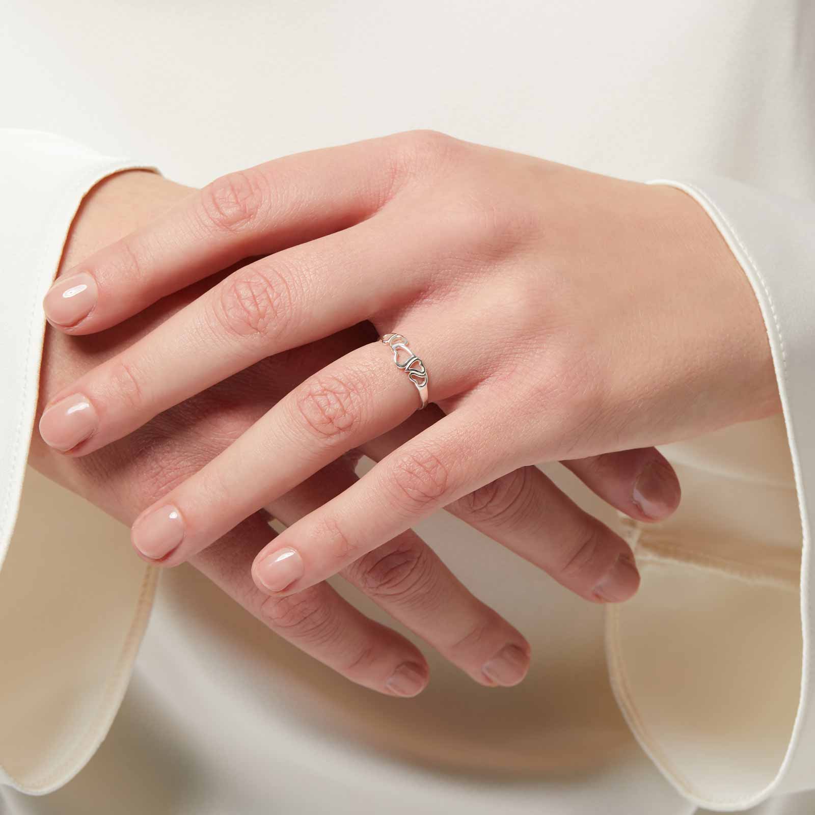 Ring i äkta silver - fem hjärtan