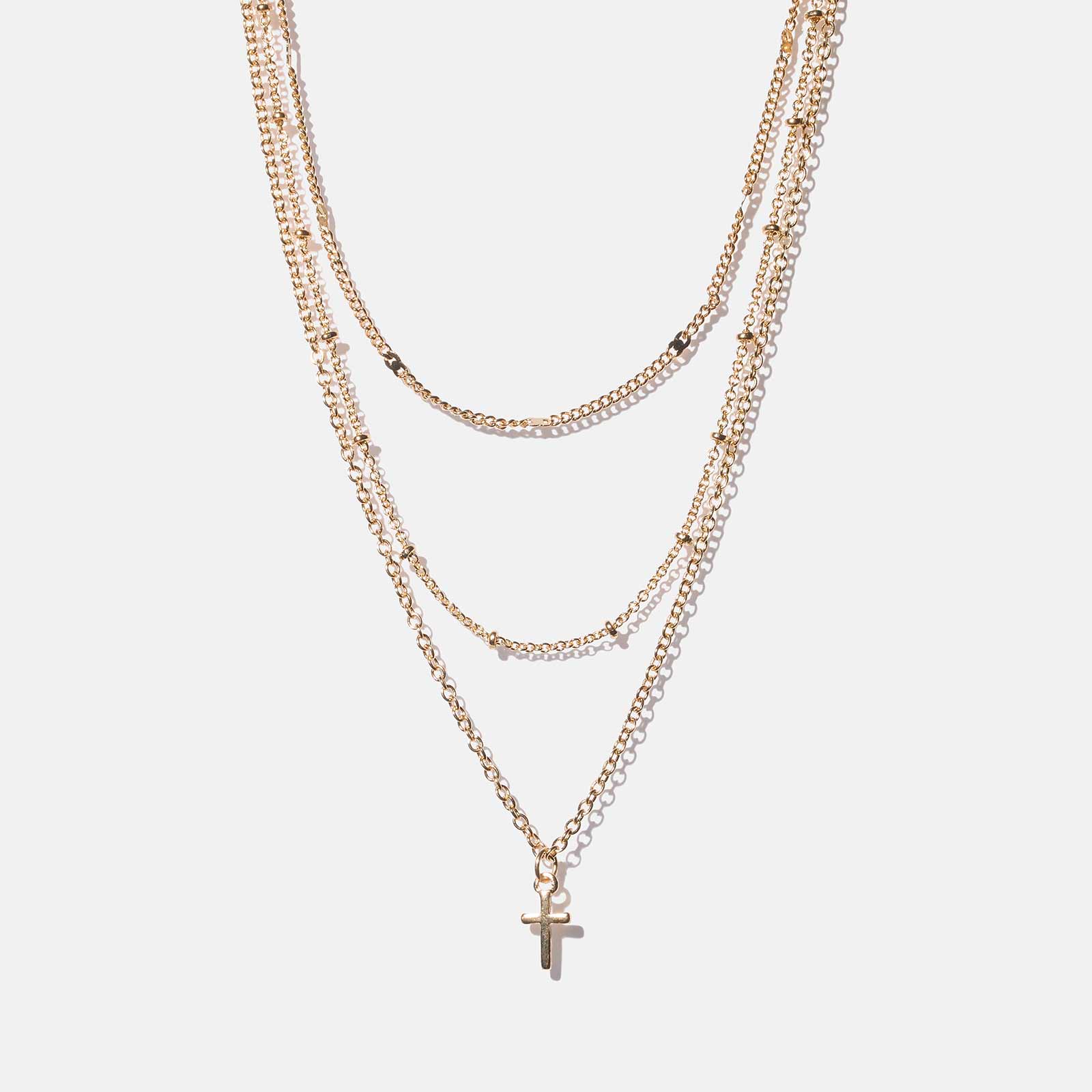 3-radigt guldfärgat halsband - kedjor och kors