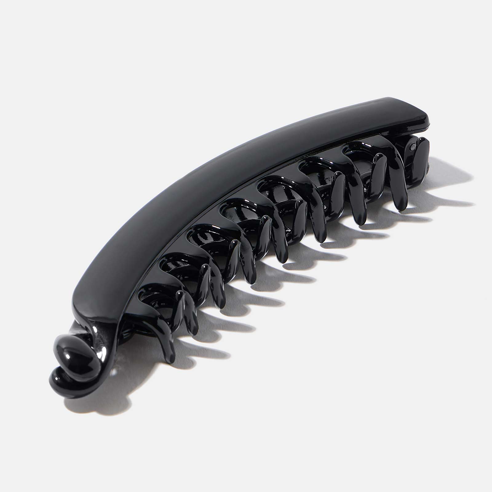 Bananklämma - svart plast, 13,5x3cm