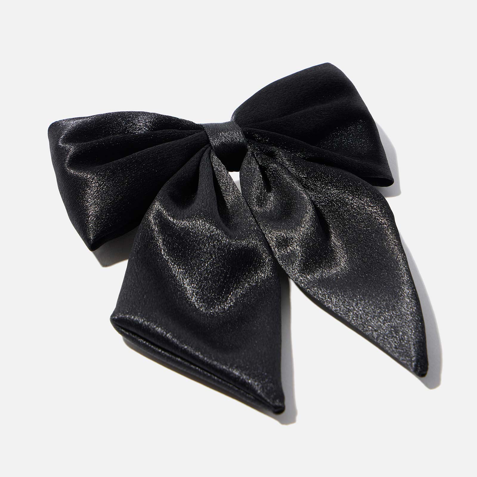 Hårklämma med svart rosett