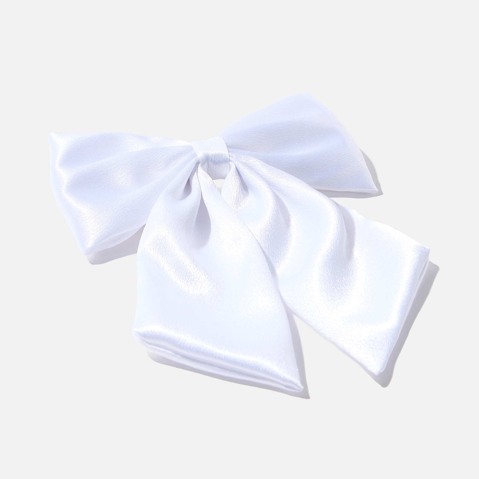 Hårklämma med vit rosett