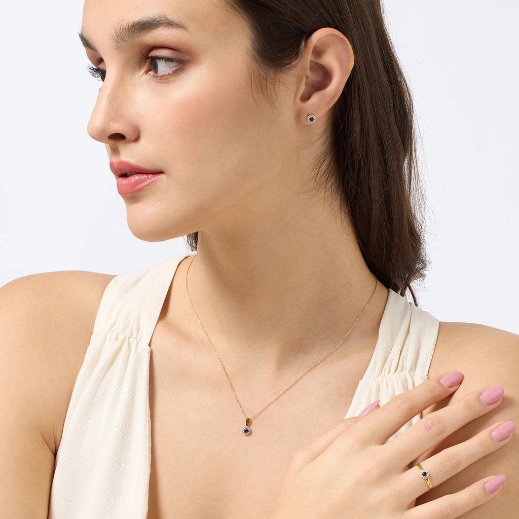 Carmoséring i 18k guld - blå och vit st. 18