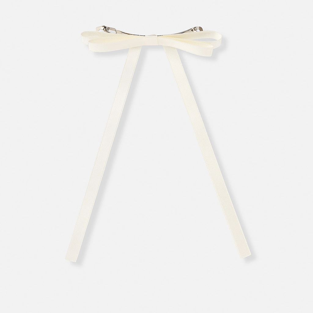 Hårklämma med vit tygrosett