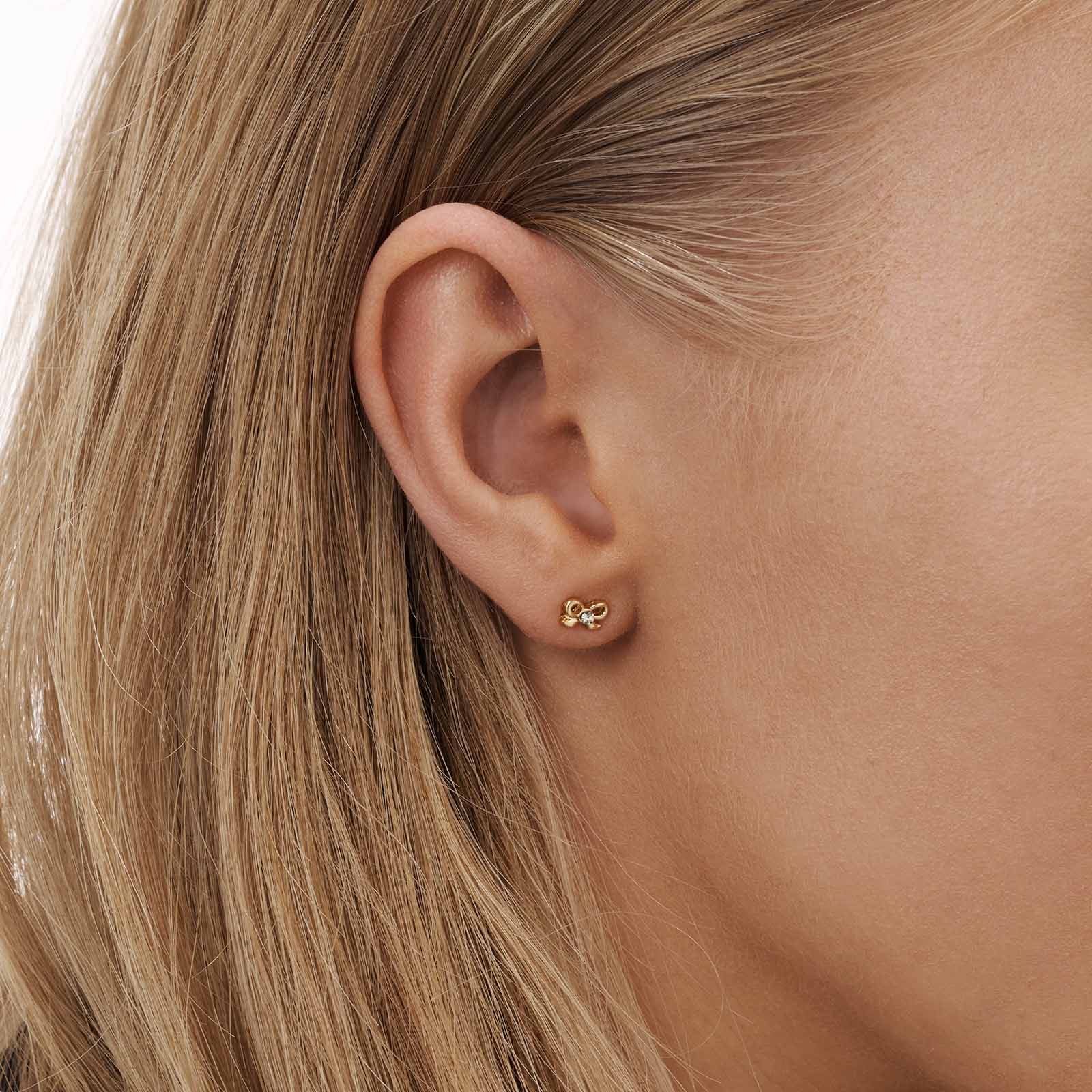 6 guldfärgade studs - olika motiv 2