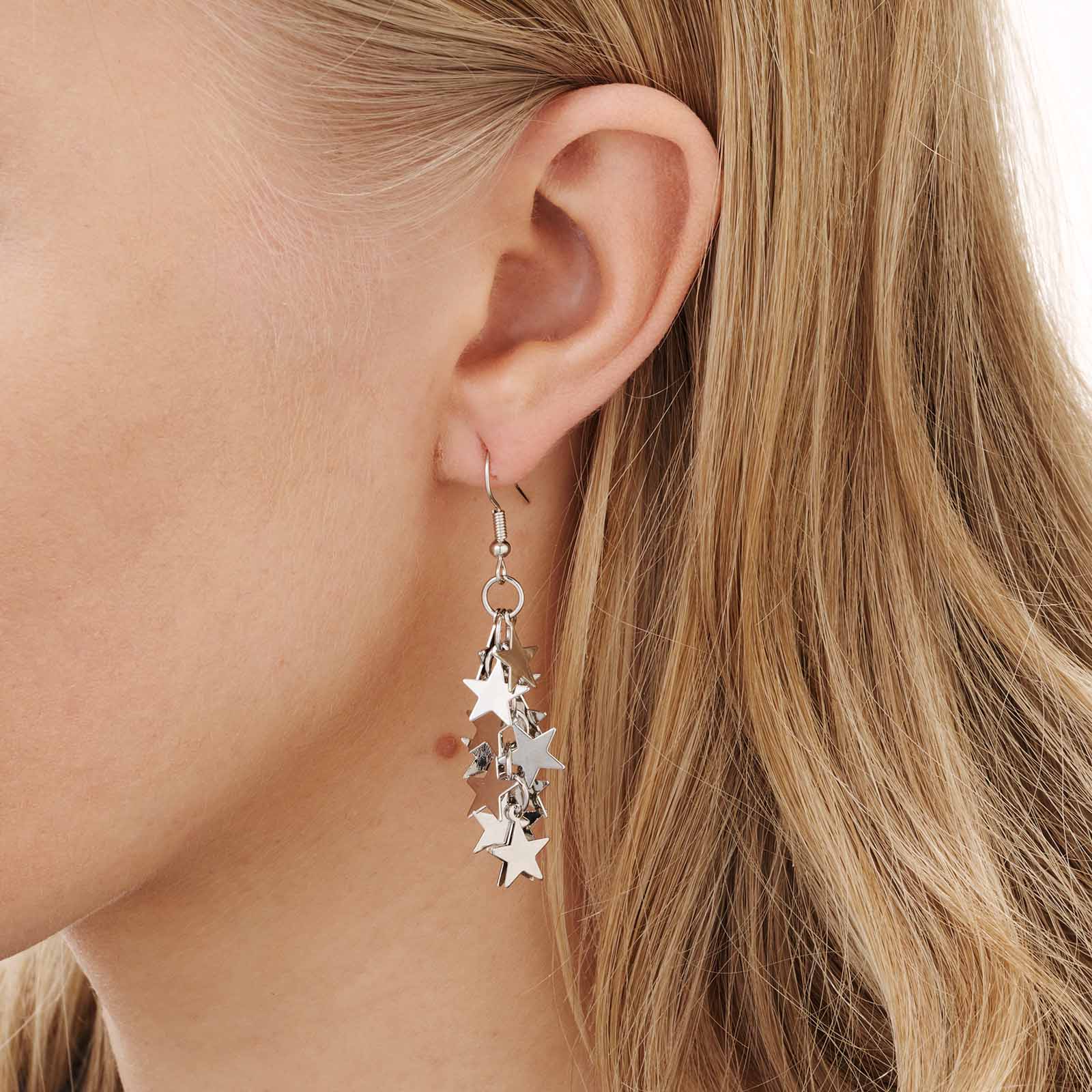 Silverfärgade örhängen - hängande stjärnor, 60mm