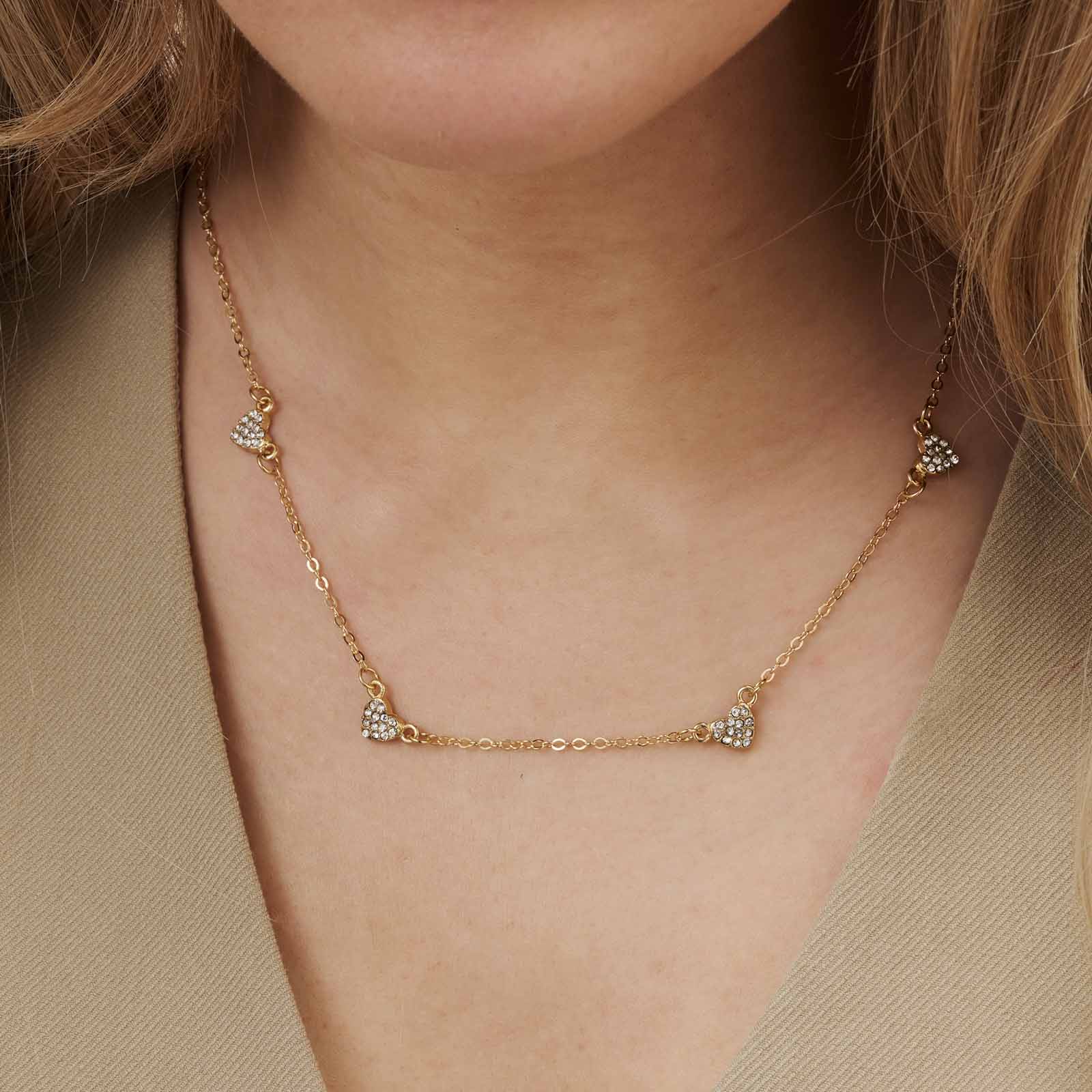 Guldfärgat halsband - fem hjärtan