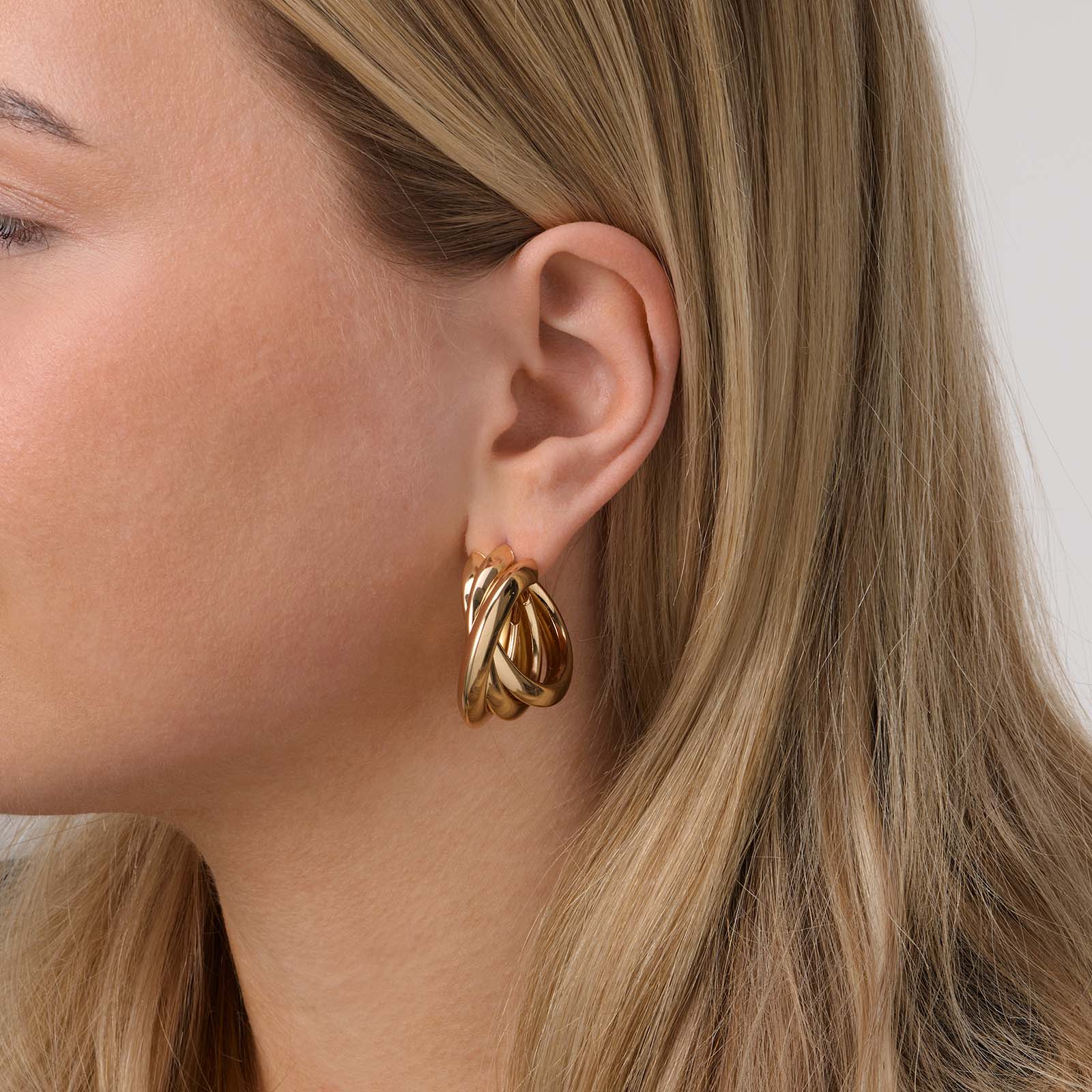 Guldfärgade örhängen, hoos vridna ringar - 40 mm