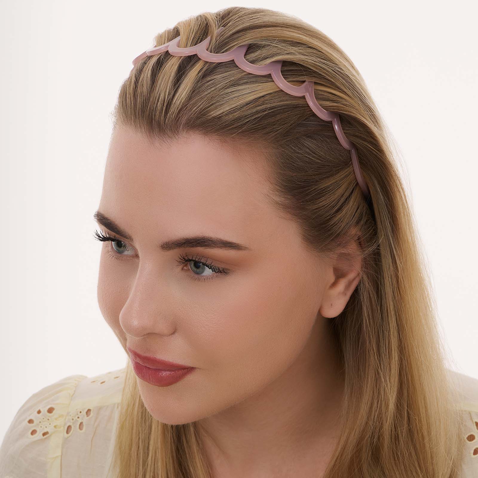 Ljusrosa diadem med piggar