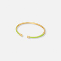 Guldpläterat armband, bangle ljusgröna detaljer - 60x50 mm