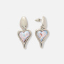 Silverfärgade örhängen, ojämna hjärtan - 36 mm