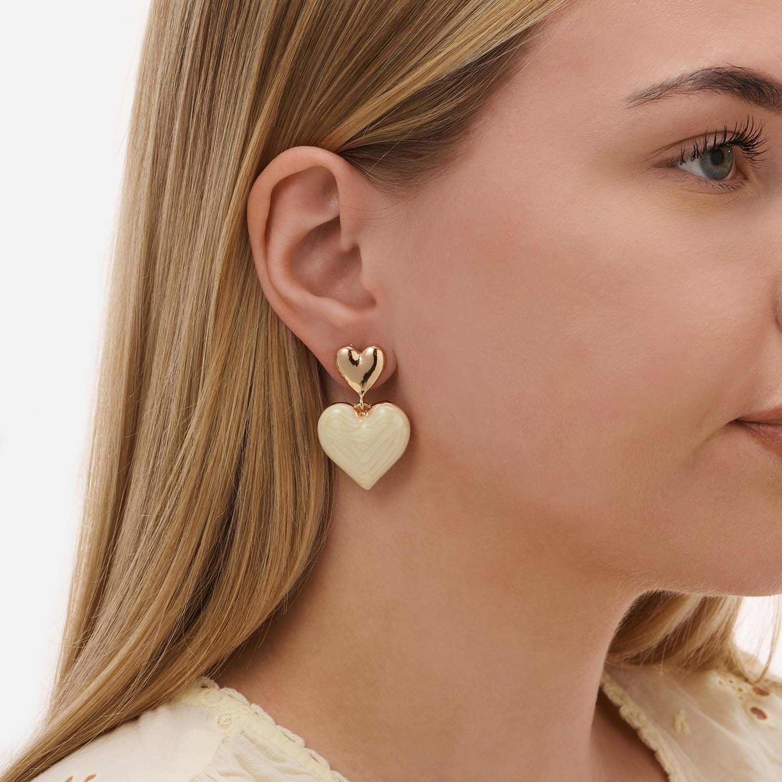 Guldfärgade örhängen, dubbla hängande hjärtan - 40 mm