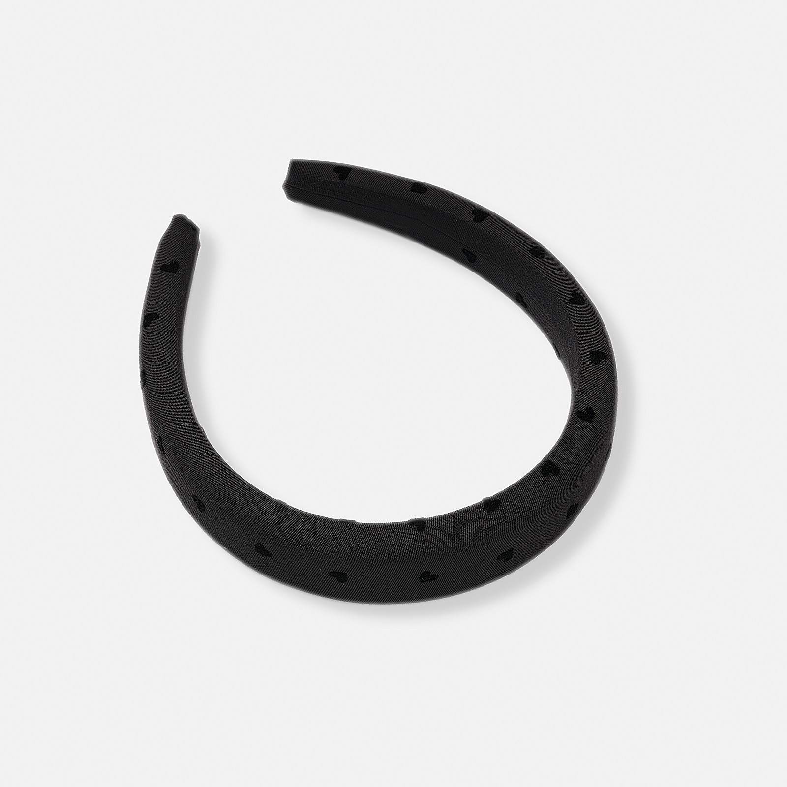 Svart vadderat tygdiadem med prickar