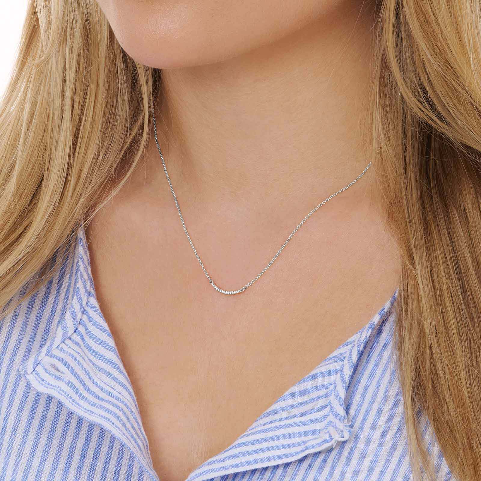 Silverfärgat halsband, båge med stenar, 42+7cm