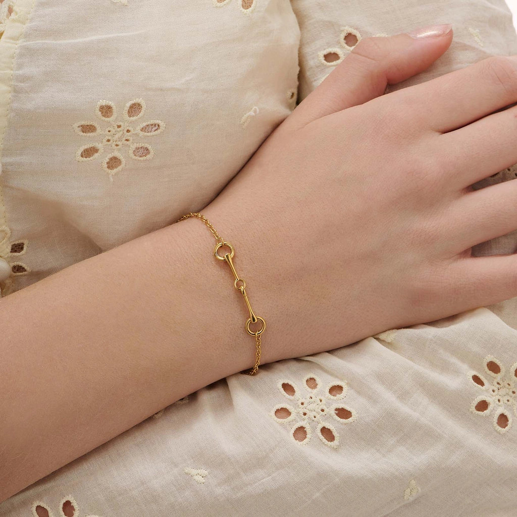 Guldpläterat stålarmband med tränsbett - 17+3 cm