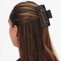 Svart hårklämma 10 cm