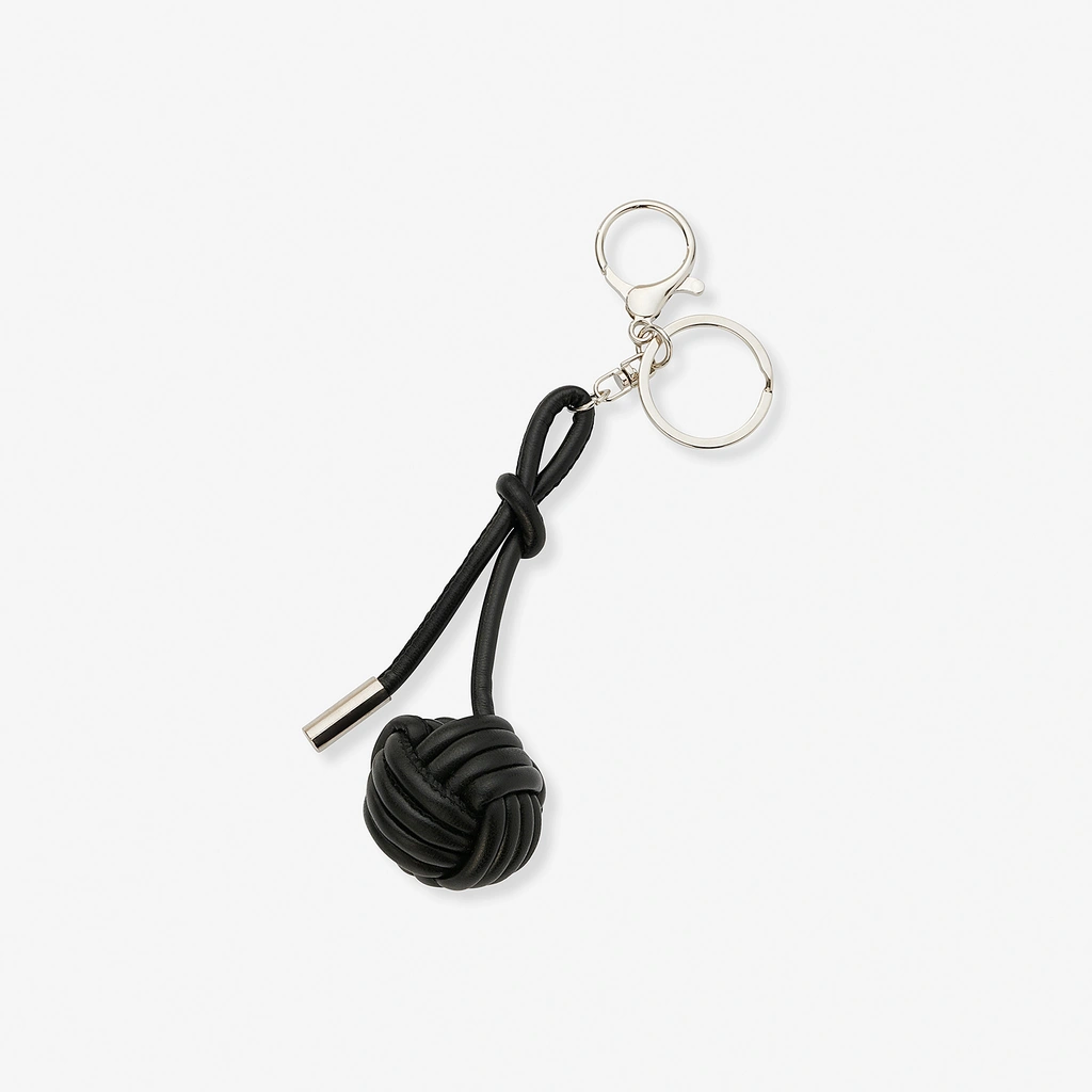 Väskaccessoar - svart knop