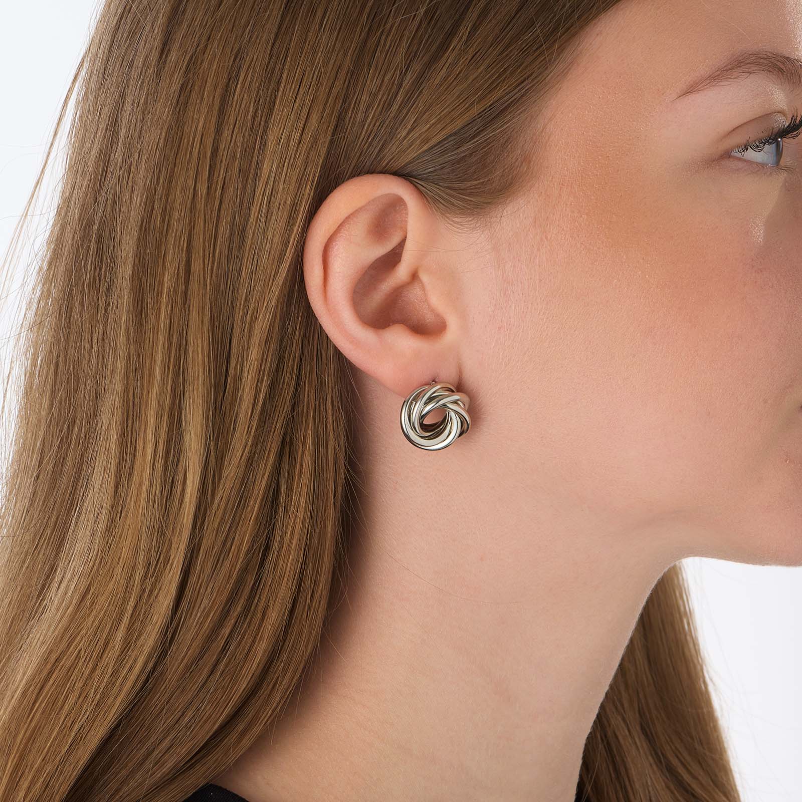 Silverfärgade örhängen, vridna ringar - 20x20mm