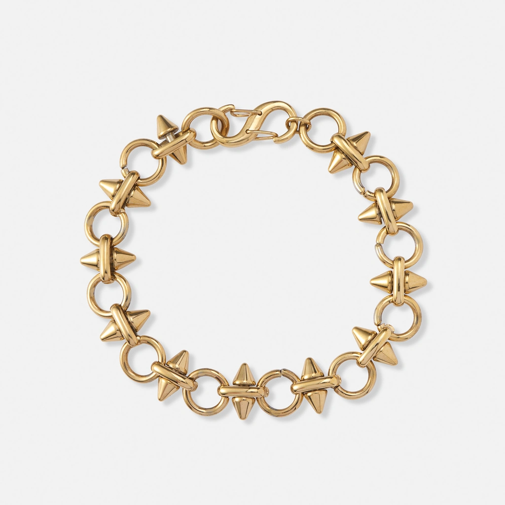 Guldpläterat stålarmband med nitar och ringar - 22cm