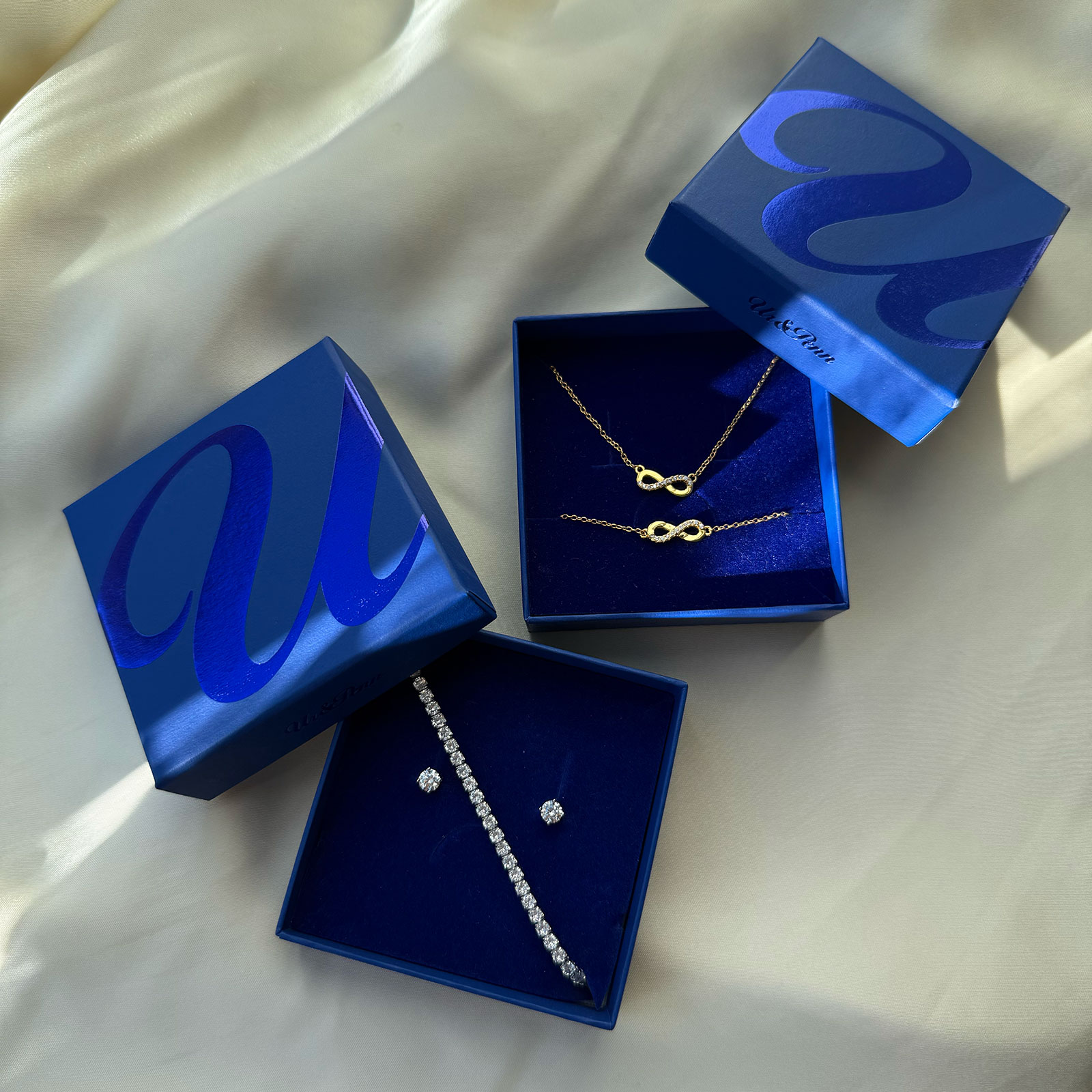 Guldpläterat set i äkta silver armband & halsband, infinity