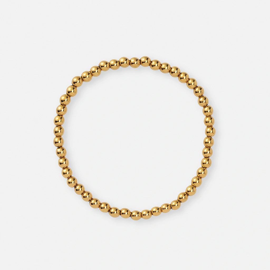 Armband i guldpläterat stål - elastiskt med 4mm kulor, 17cm