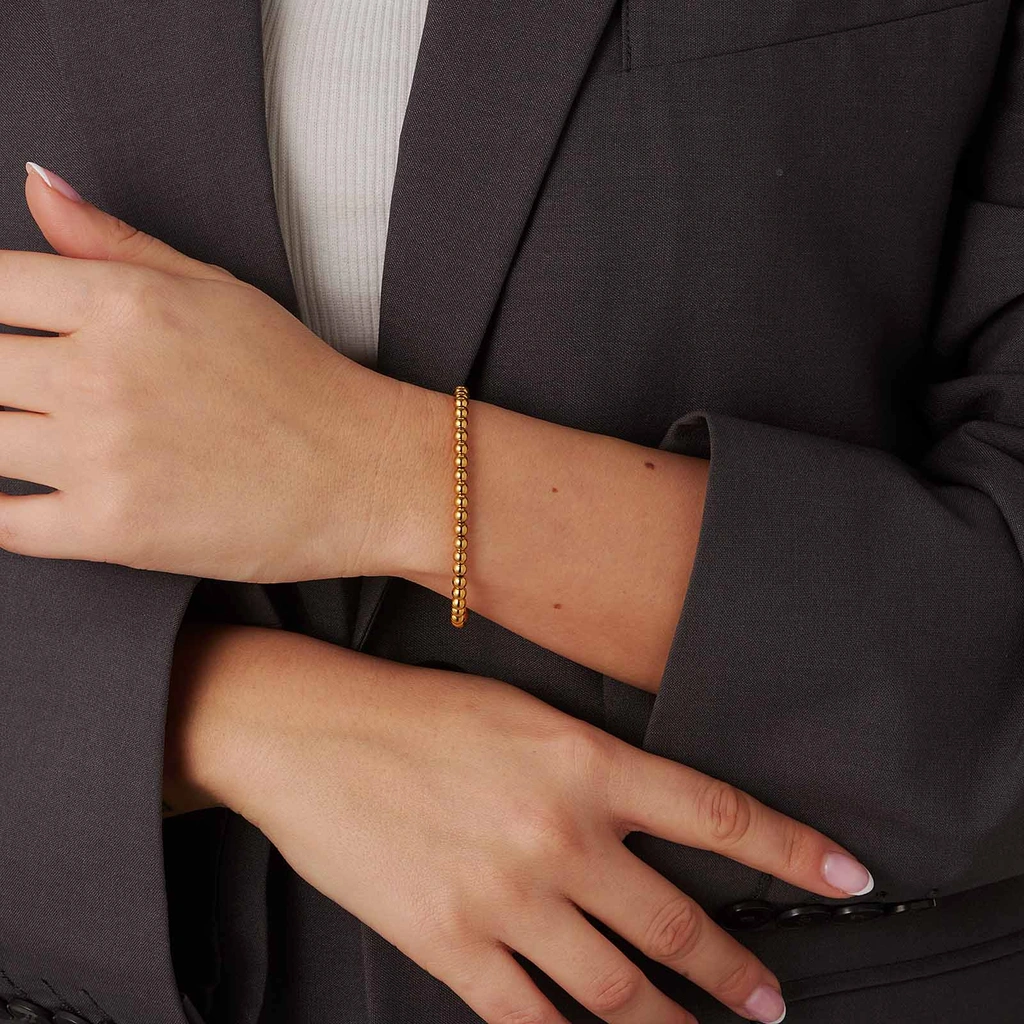 Armband i guldpläterat stål - elastiskt med 4mm kulor, 17cm