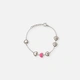 Armband i stål - hjärtan med rosa emalj, 14+2 cm