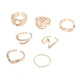 Guldfärgade ringar 7-pack, varierande mönster - 19mm