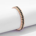 Guldfärgat armband Spike Noir, svarta stenar med nitar - Elastiskt