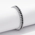Silverfärgat armband Spike Noir, svarta stenar med nitar - Elastiskt