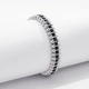 Silverfärgat armband Spike Noir, svarta stenar med nitar - Elastiskt