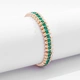 Guldfärgat armband Spike Noir, gröna stenar - Elastiskt