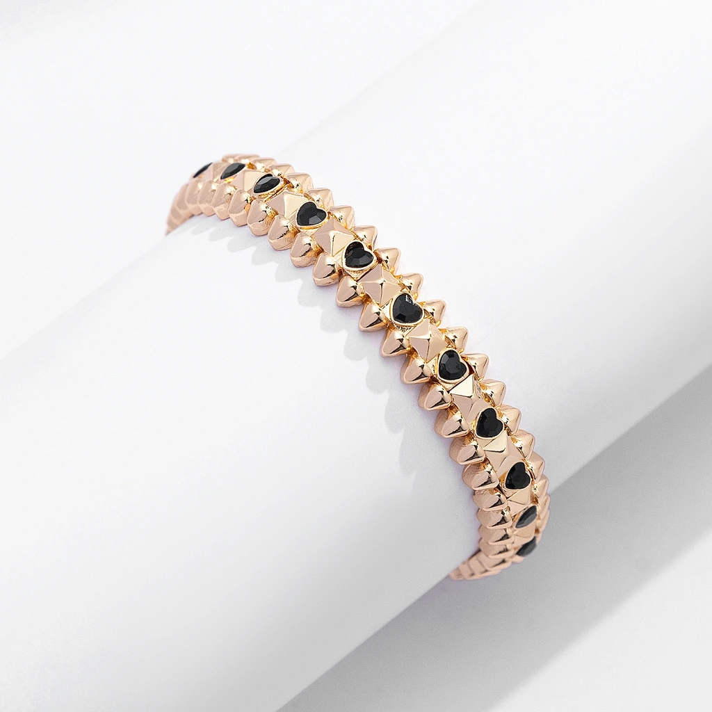 Guldfärgat armband Spike Noir, svarta hjärtan - Elastiskt