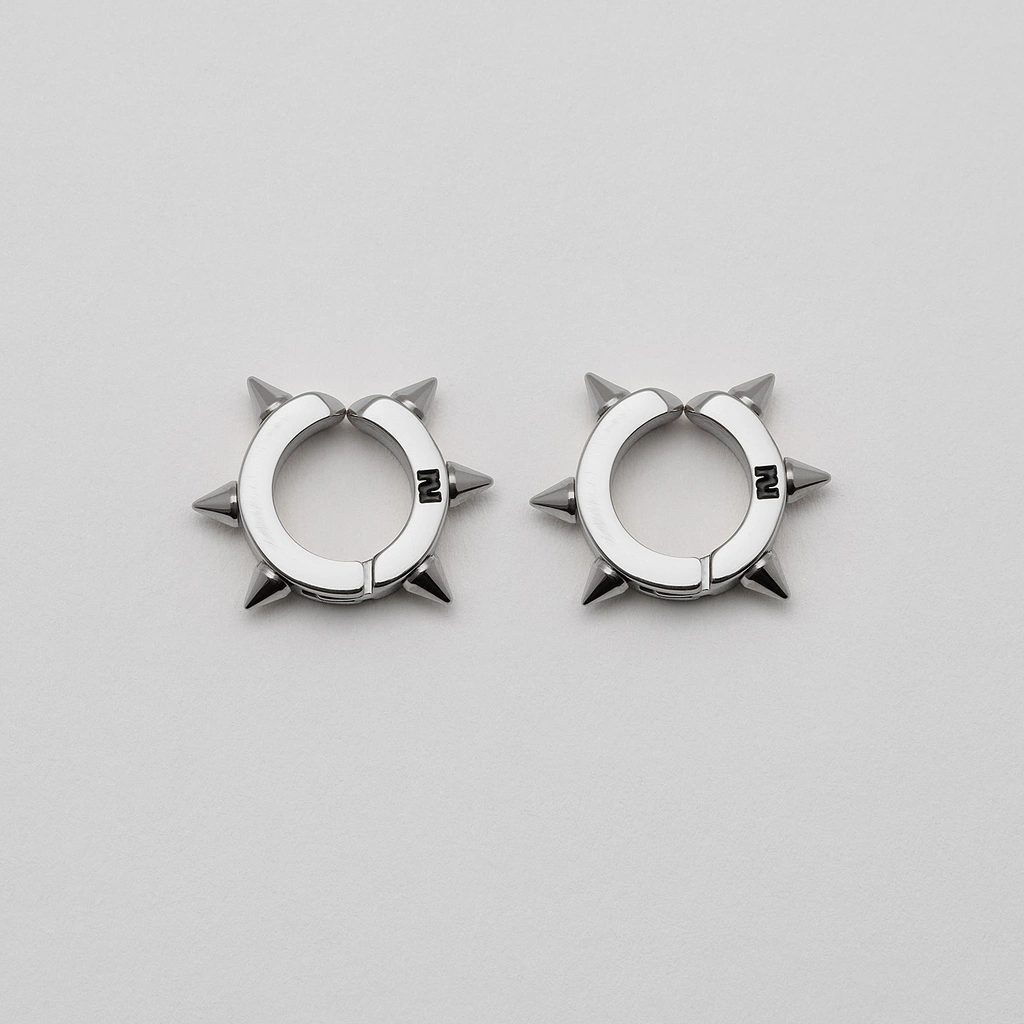 Örhängen stål: Ear cuff med nitar - one size