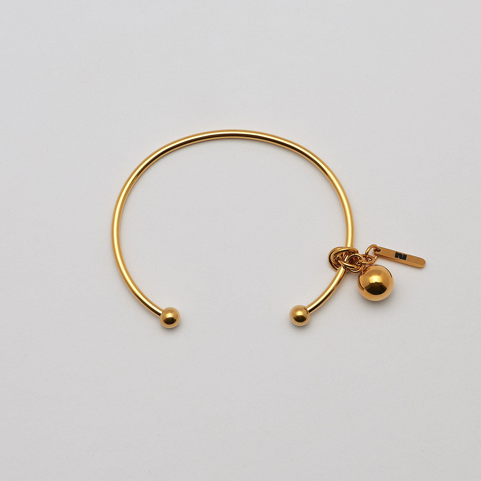 Armband i guldpläterat stål, bangle med boll - 2,5 x 66,5 mm