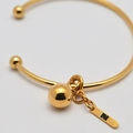 Armband i guldpläterat stål, bangle med boll - 2,5 x 66,5 mm