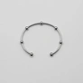 Armband i guldpläterat stål, bangle med boll - 2,5 x 66,5 mm