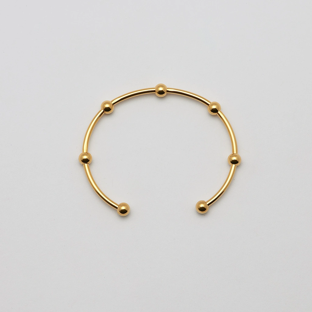 Armband i guldpläterat stål, bangle med bollar - 2,5x66,5 mm