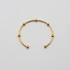 Armband i guldpläterat stål, bangle med bollar - 2,5x66,5 mm