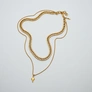 Halsband i guldpläterat stål, dubbelkedja med pil - 50/57+5 cm