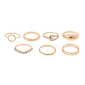 Guldfärgade ringar, 7-pack med glasstenar - Storlek 17