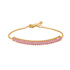 Guldpläterat armband med rosa stenar